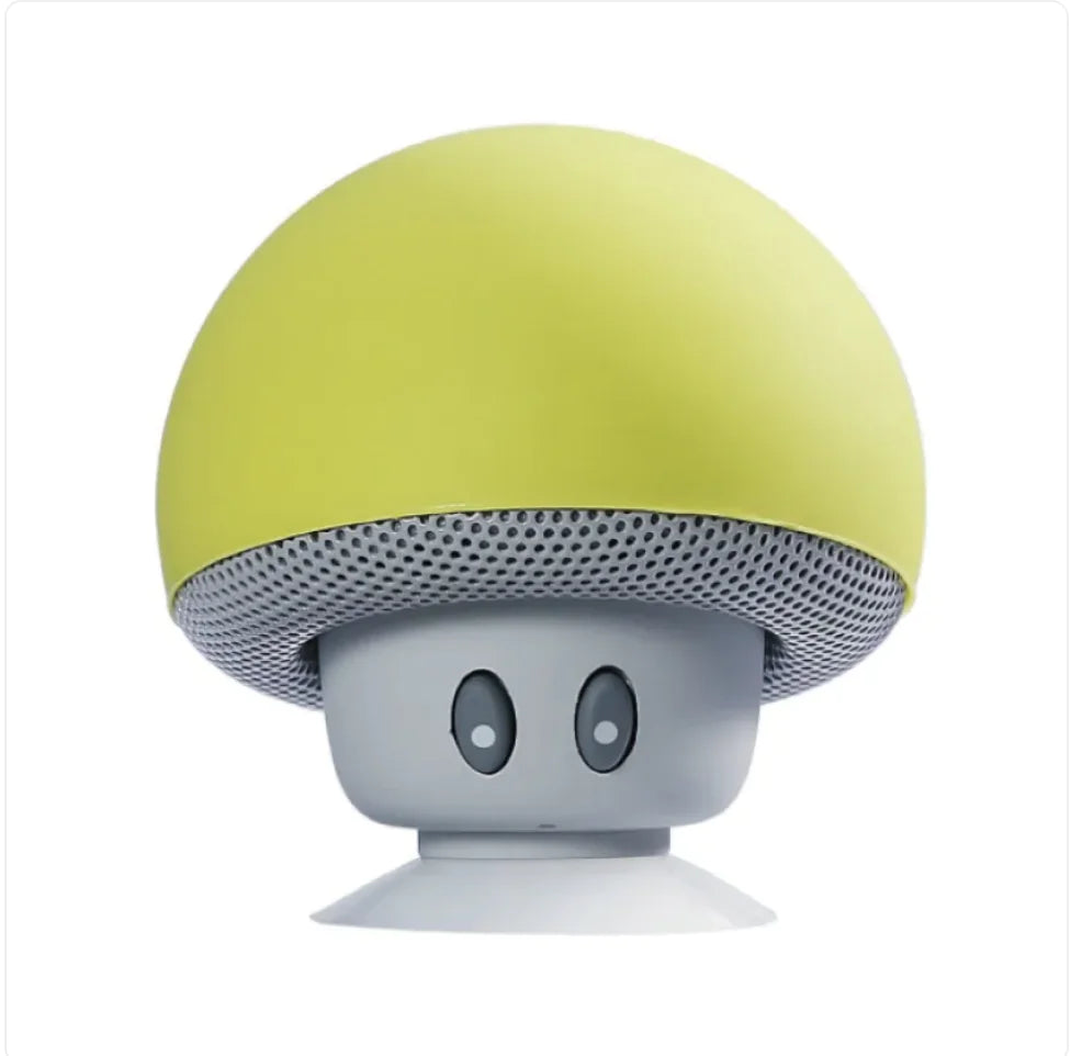 Yellow mushroom-shaped speaker on a white background