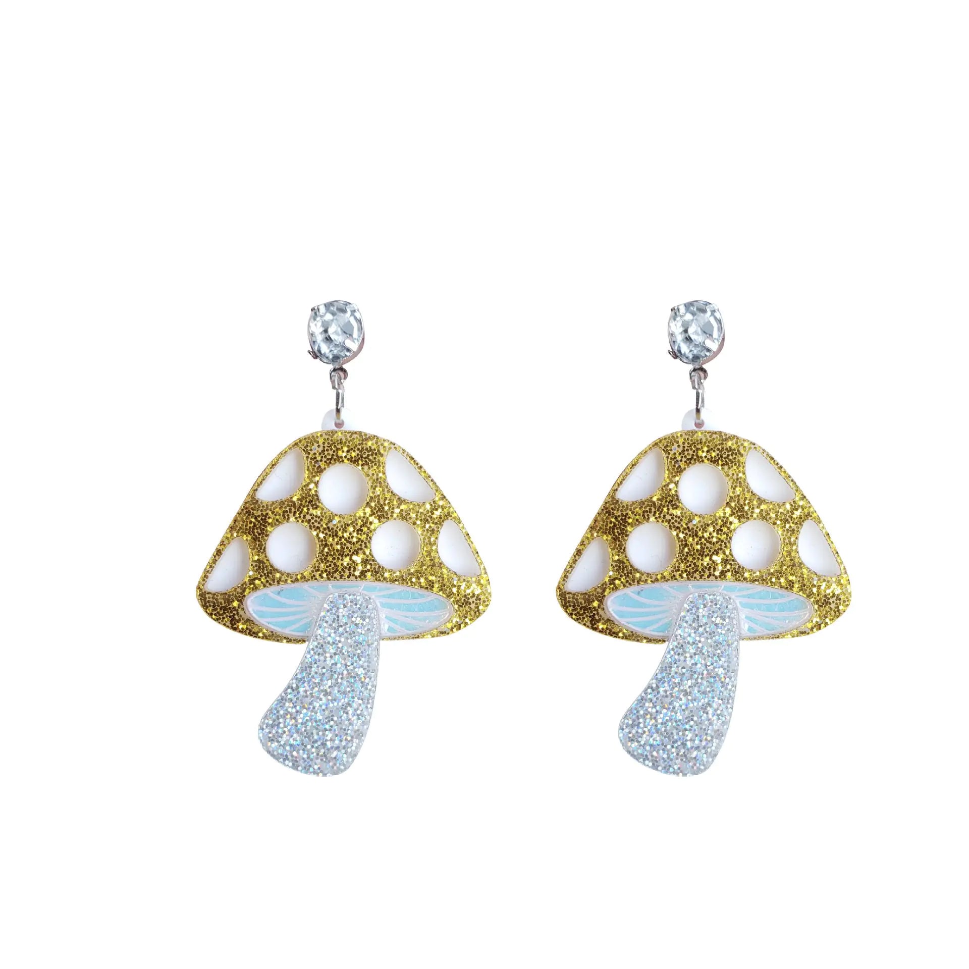 Mushroom-shaped earrings with gold and blue glitter on a white background
