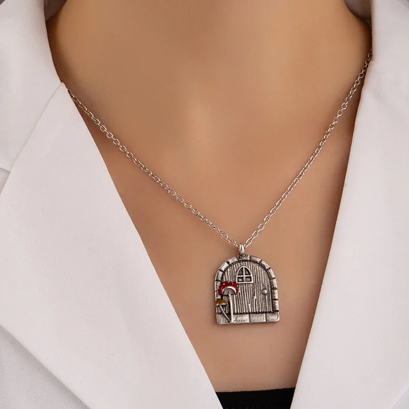 Necklace with a detailed pendant on a mannequin