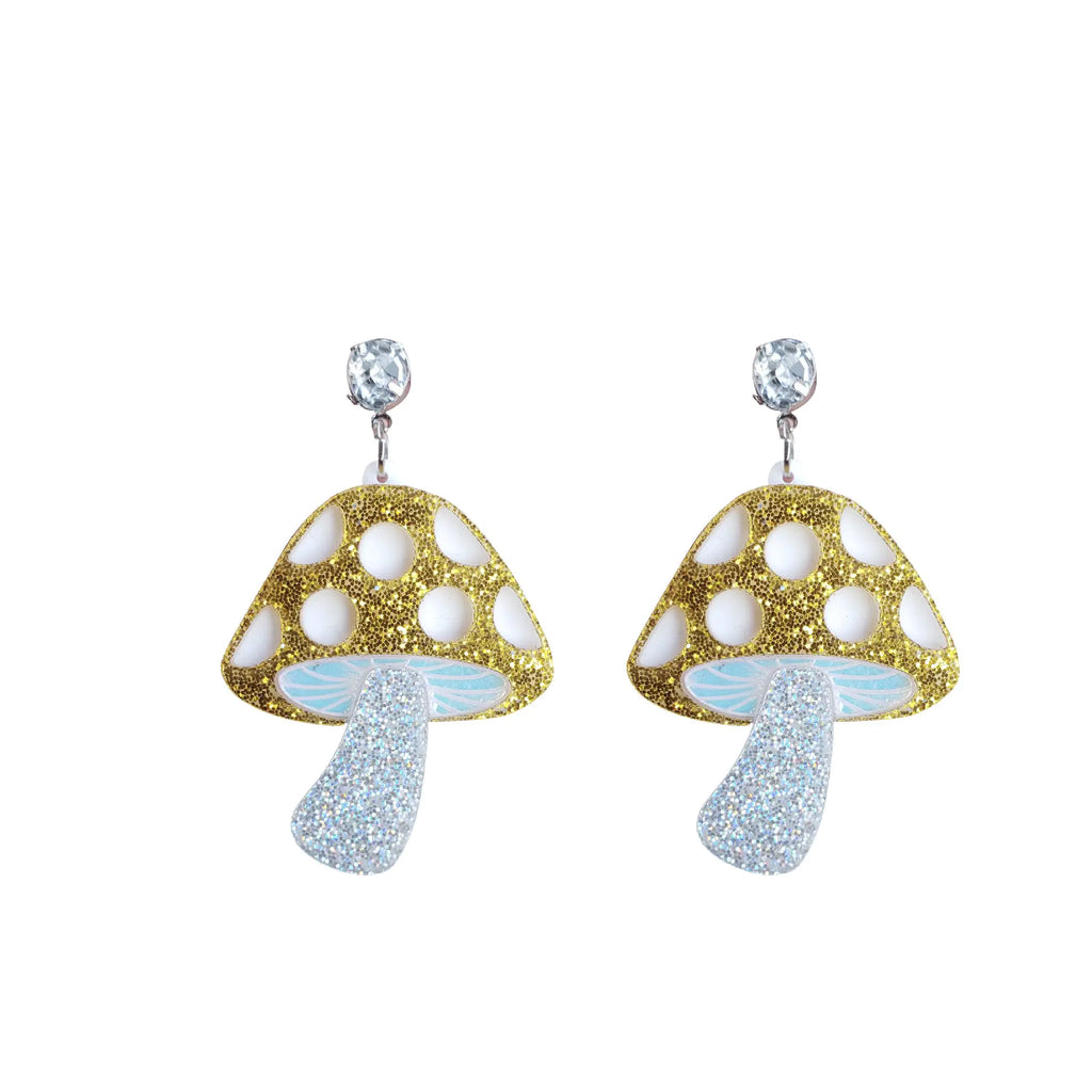 Mushroom-shaped earrings with gold and blue glitter on a white background
