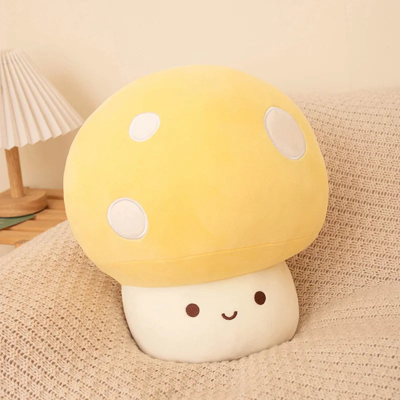 Cute plush mushroom toy with a smiling face on a textured surface