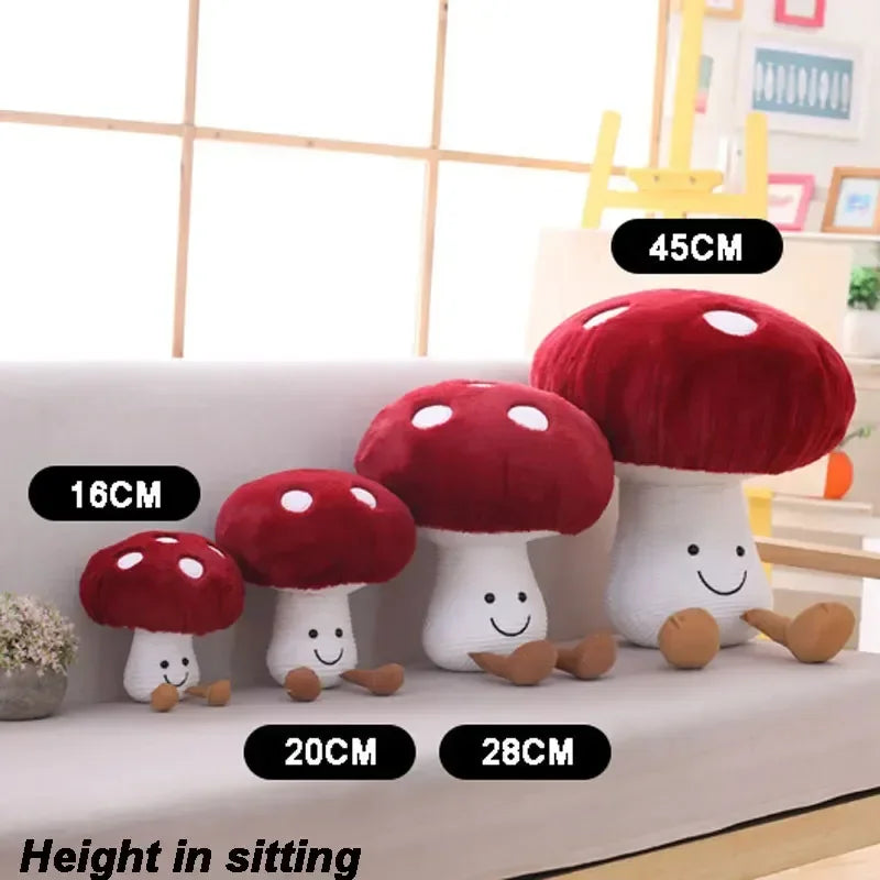 Set of red and white mushroom-shaped plush toys with size labels on a shelf.