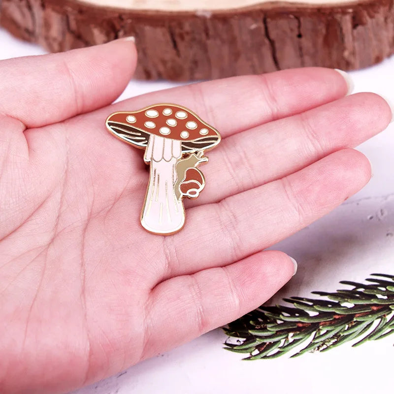 Mushroom-shaped pin held in a hand with a natural background