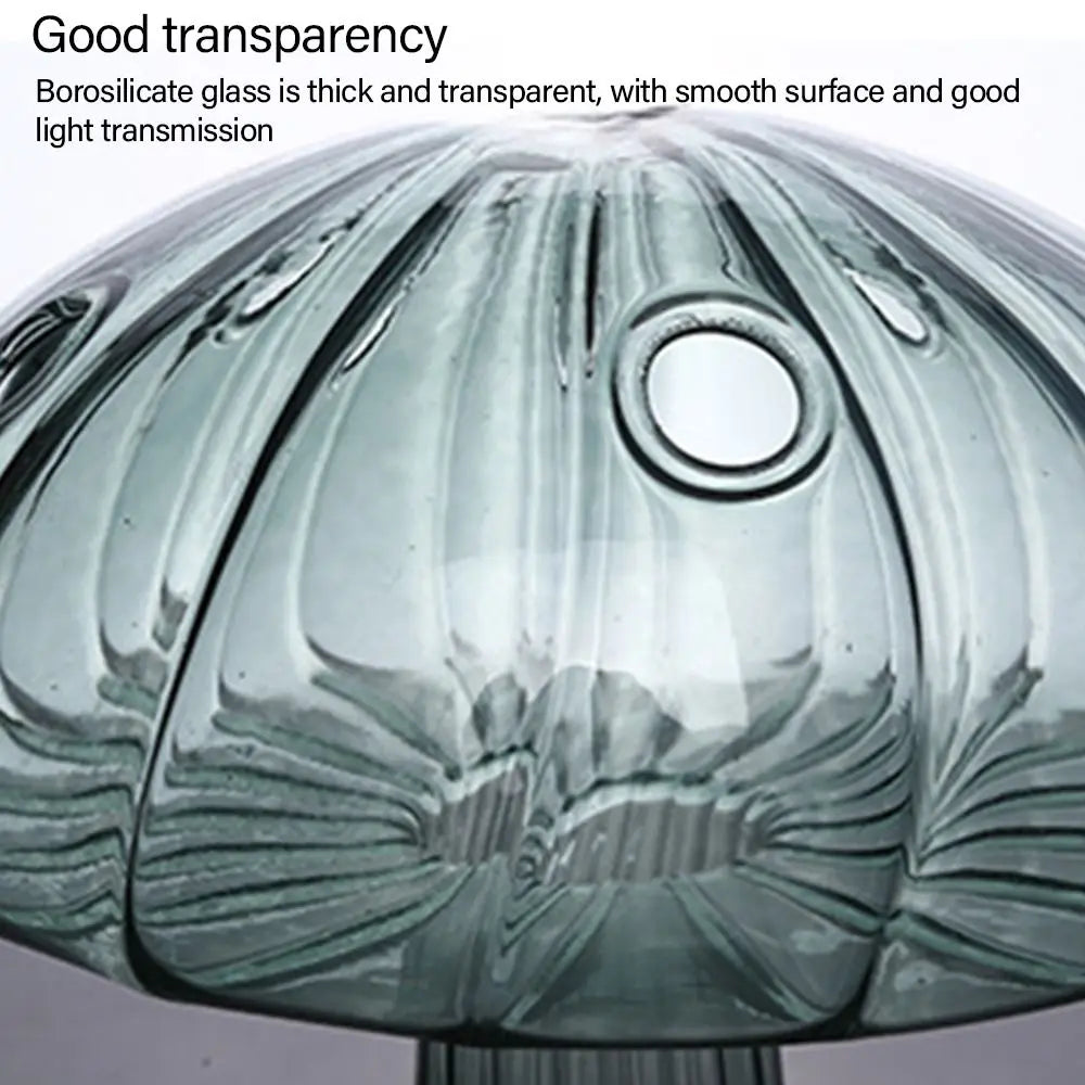 Glass lampshade with text about borosilicate glass properties