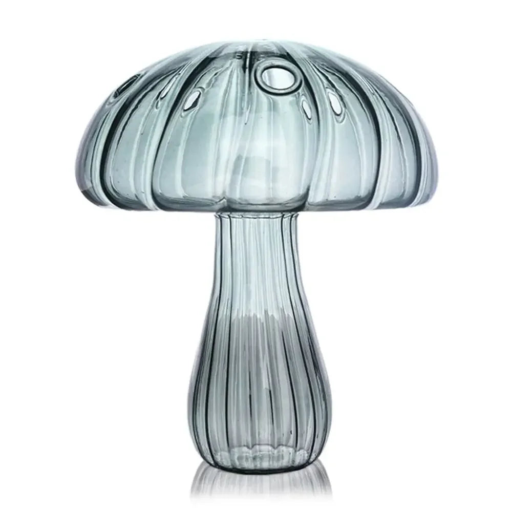 Glass mushroom-shaped lamp on a white background