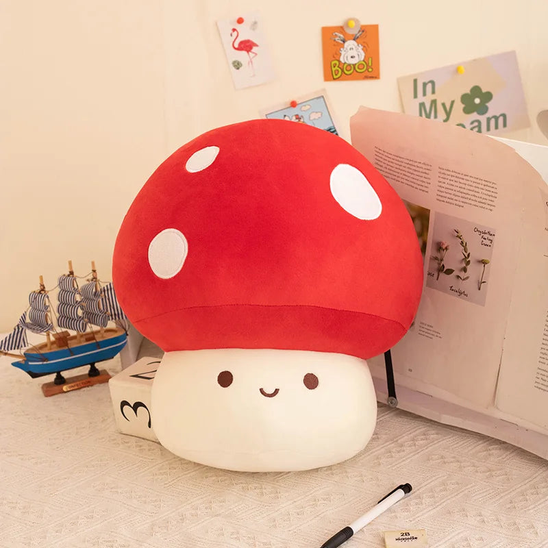 Cute mushroom-shaped plush toy on a surface with books and stationery items.