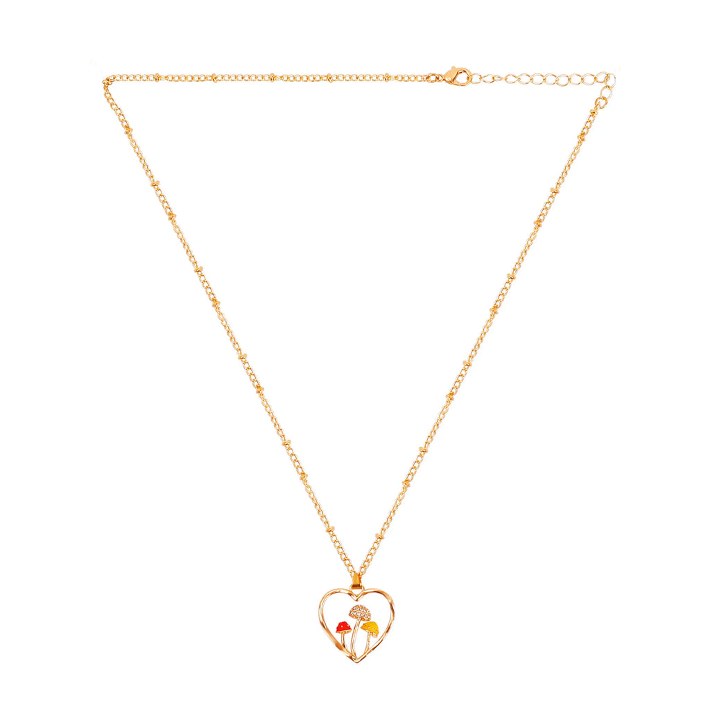 Gold necklace with a heart-shaped pendant on a white background