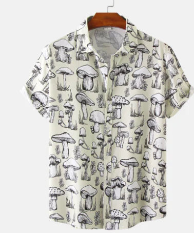 Short-sleeve shirt with mushroom pattern on a hanger against a white background