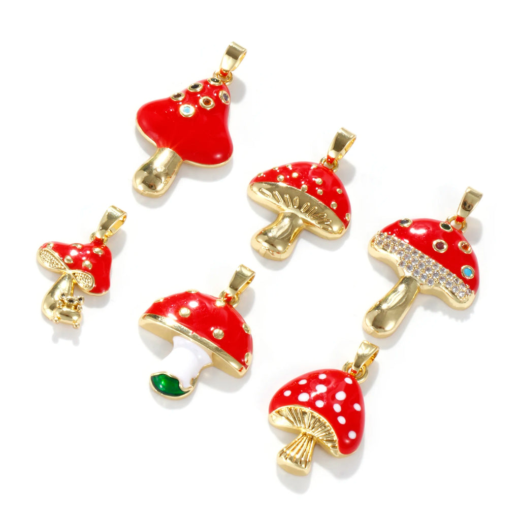 Red mushroom-shaped pendants with gold accents on a white background