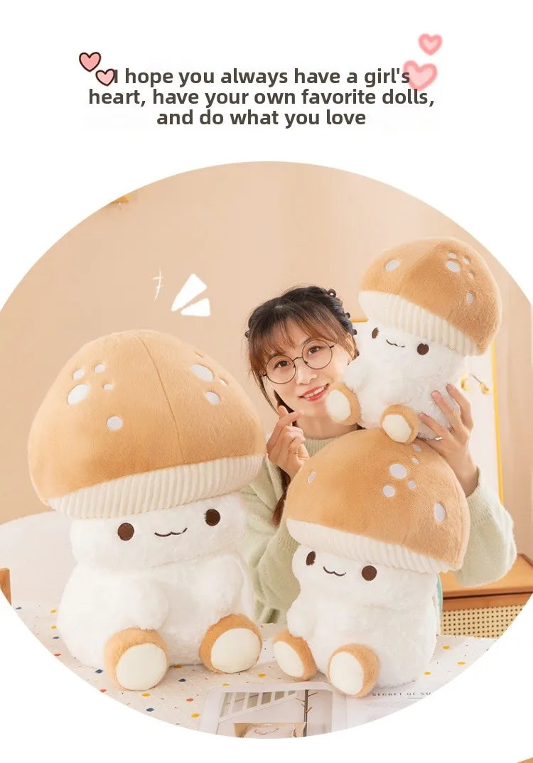 Person holding two cute mushroom-shaped plush toys with a heart-themed text overlay.