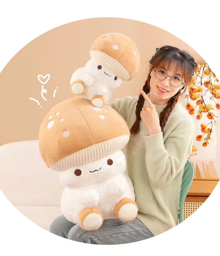 Person holding a plush mushroom toy with a decorative background