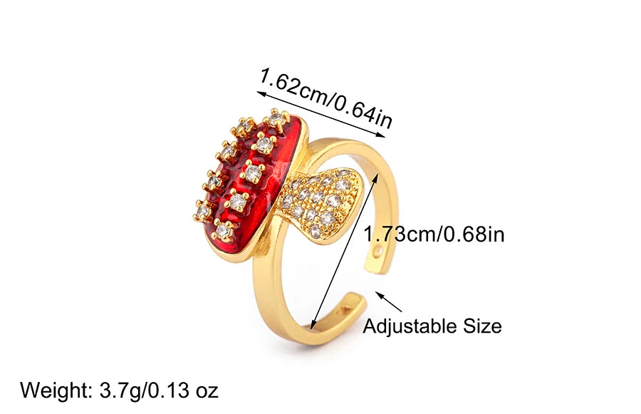 Gold ring with red and clear gemstones, showing measurements and weight on a white background.