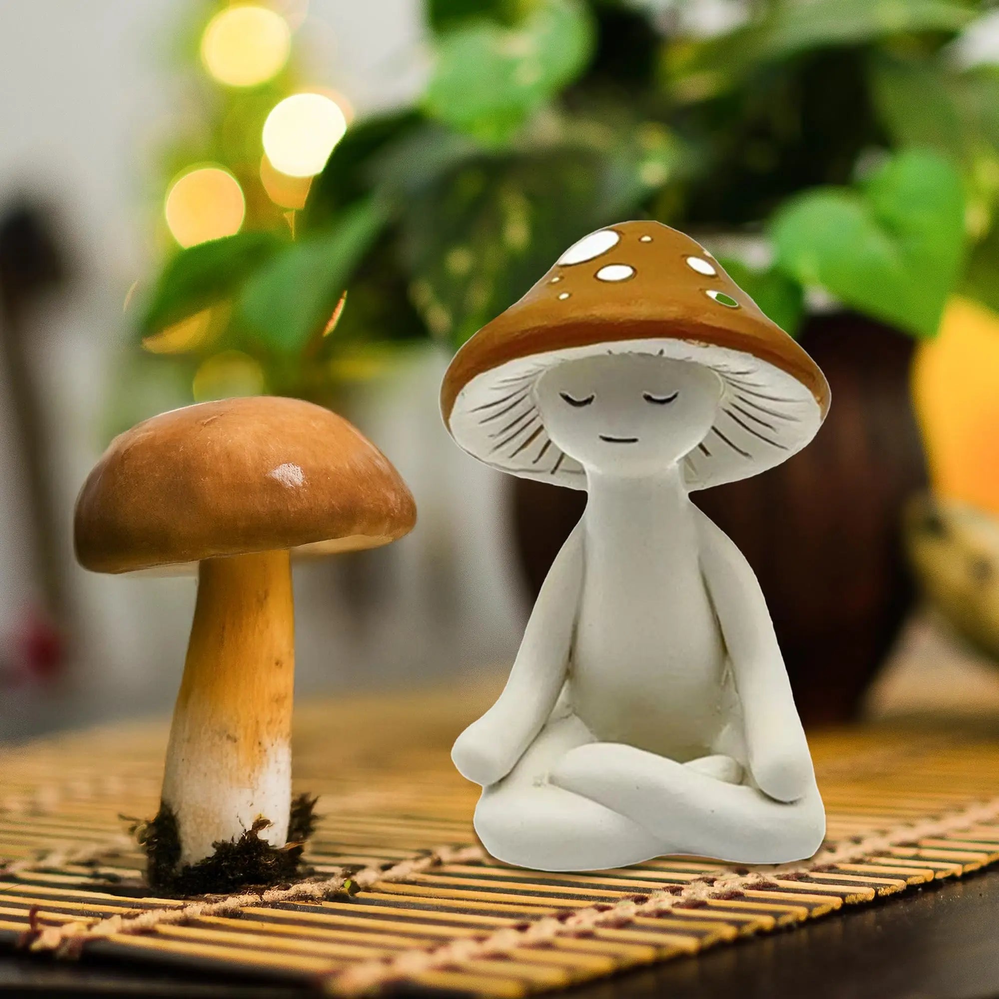 Mushroom-shaped figurine with a white base on a woven surface with blurred greenery in the background
