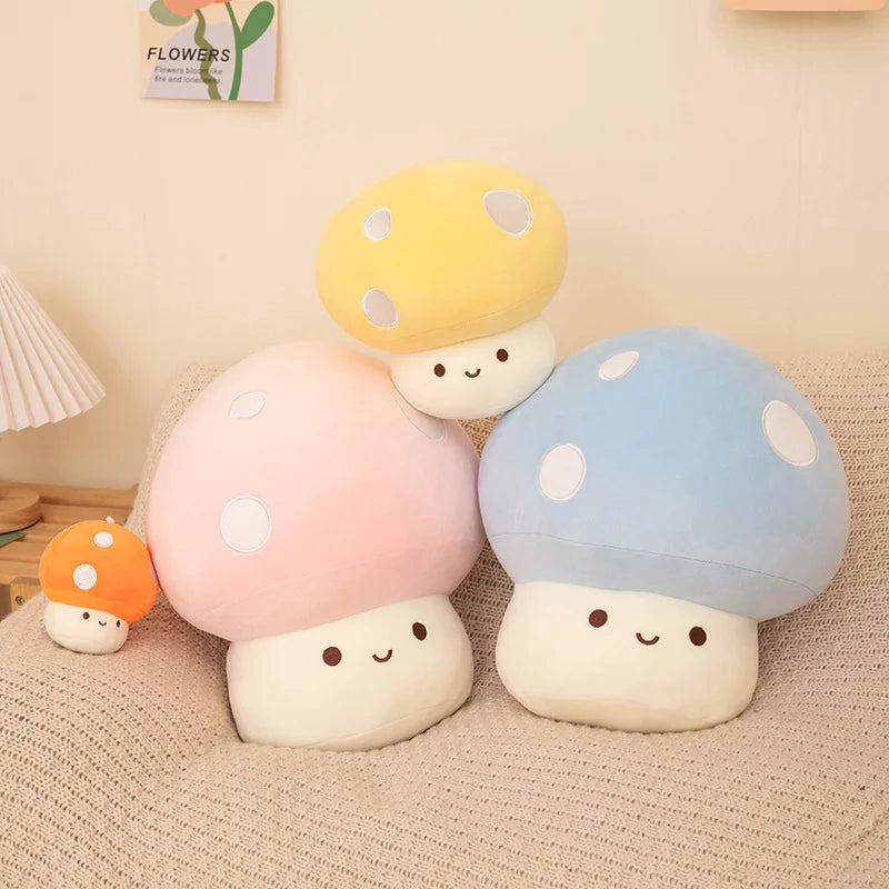 Set of colorful mushroom-shaped plush toys on a textured surface.