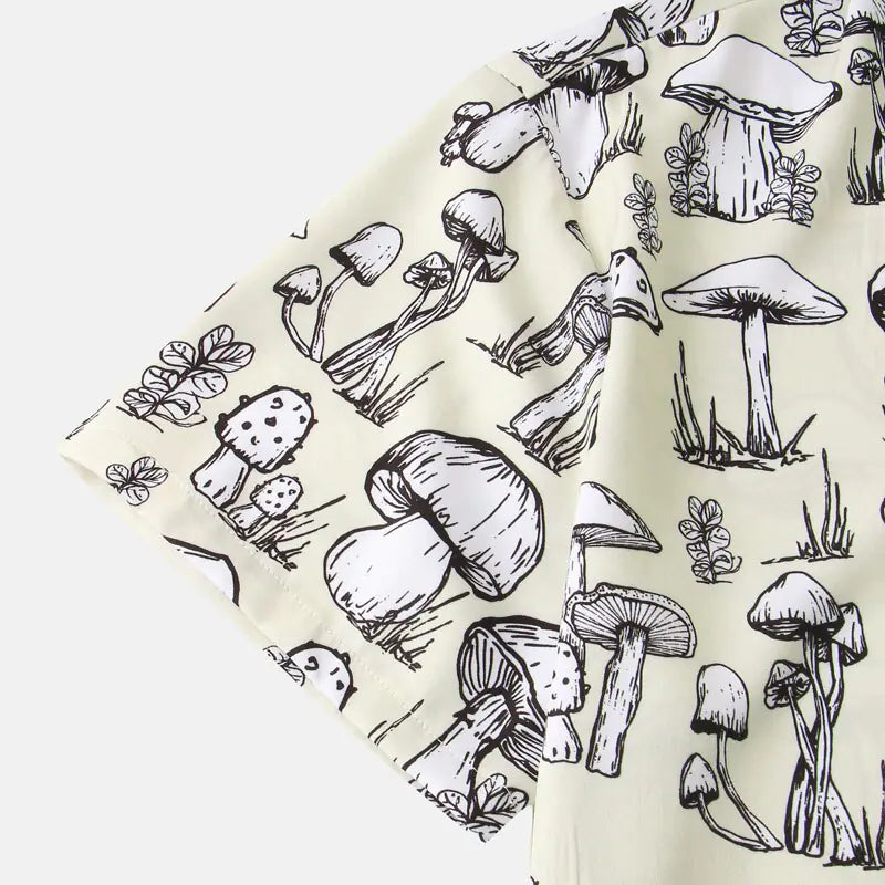 Fabric with black mushroom illustrations on a white background