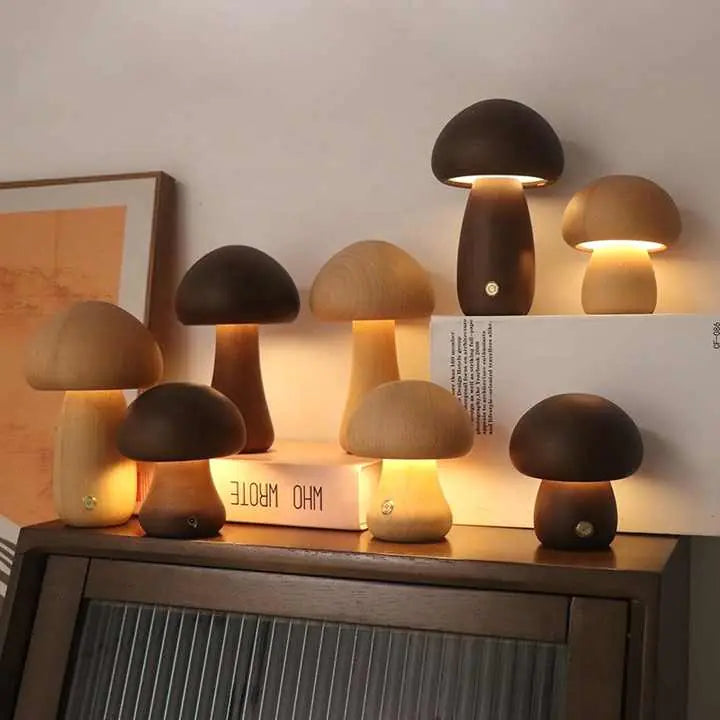 Mushroom-shaped lamps on a wooden surface with a neutral background