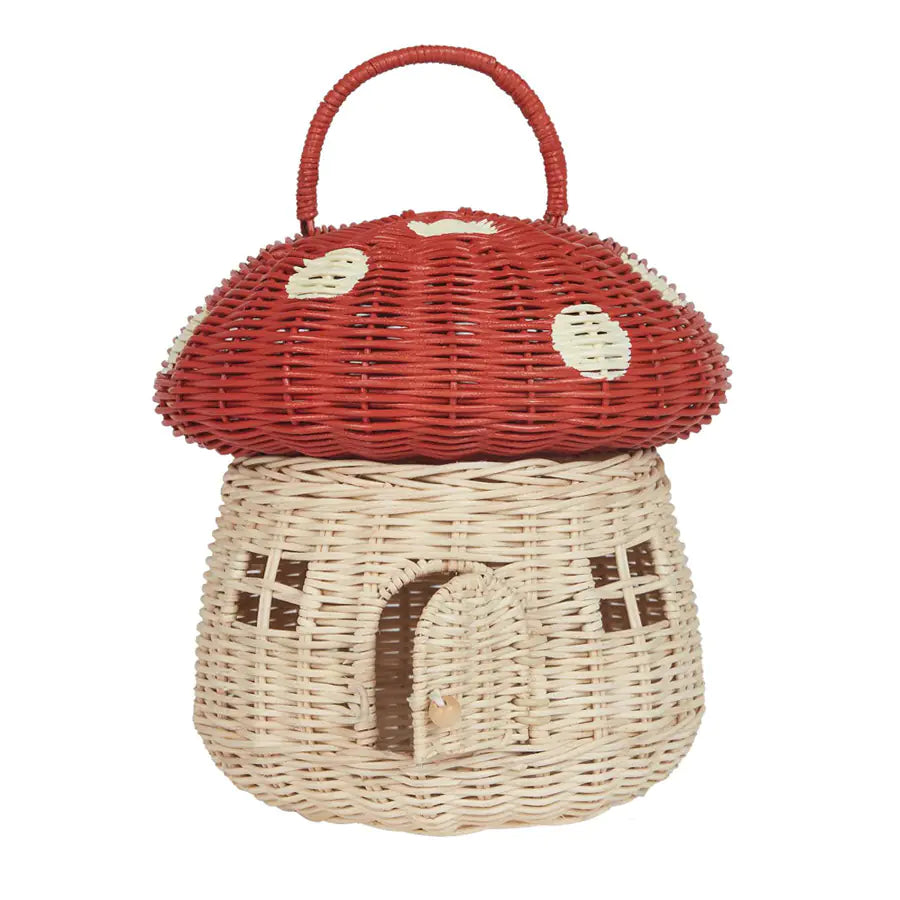 Wicker basket designed like a mushroom with a red cap and beige body on a white background
