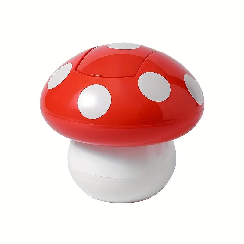 Red and white mushroom-shaped object on a white background