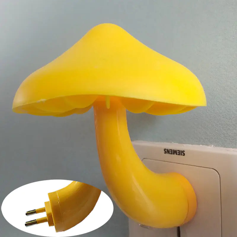 Yellow mushroom-shaped plug with Siemens branding on a gray background