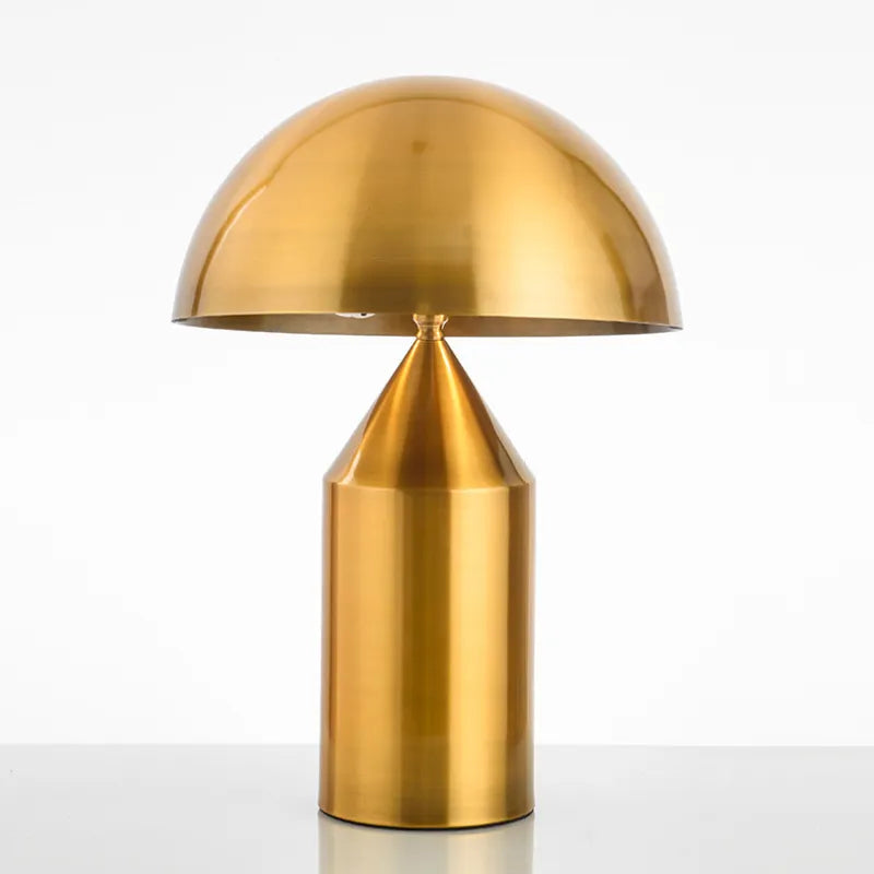 Gold table lamp on a white background